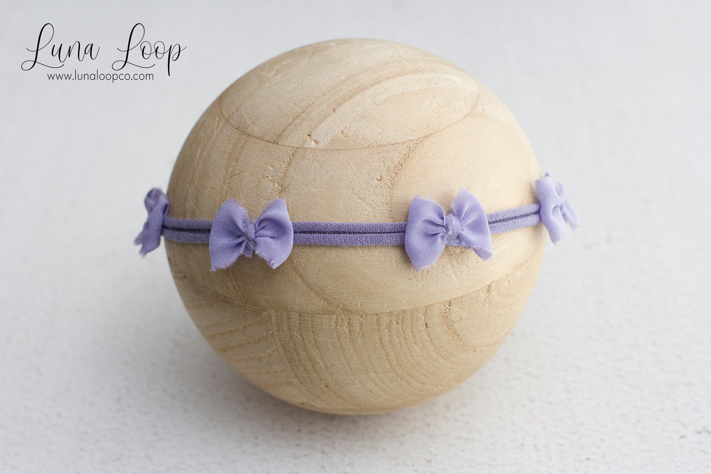 Purple | quad bow