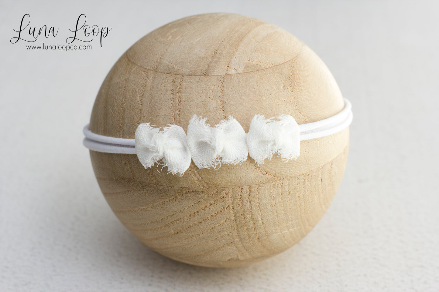 White | trio bow