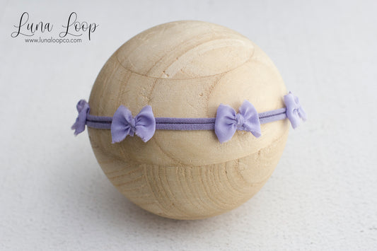 Purple | quad bow
